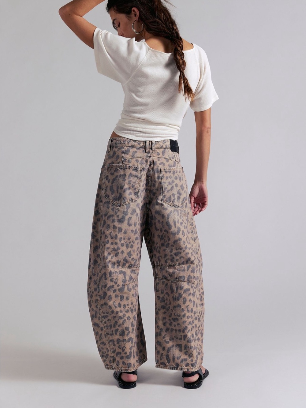We The Free Leopard Print mid rise barrel Jeans in Light brown and faded black. - Picture 6 of 9